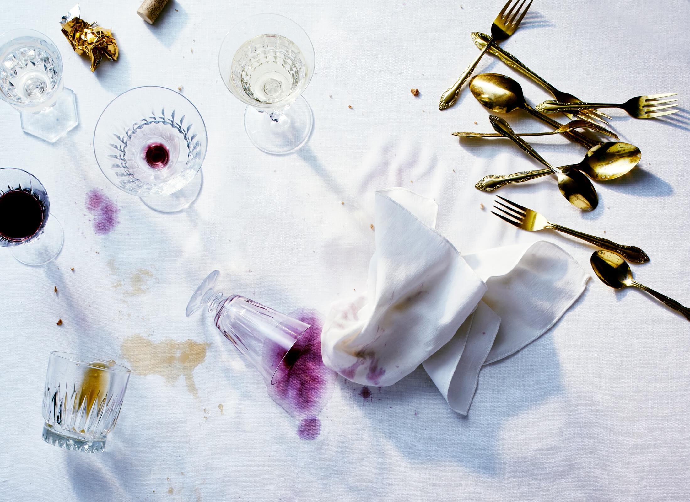 wine | spill | table | cloth | party | over  